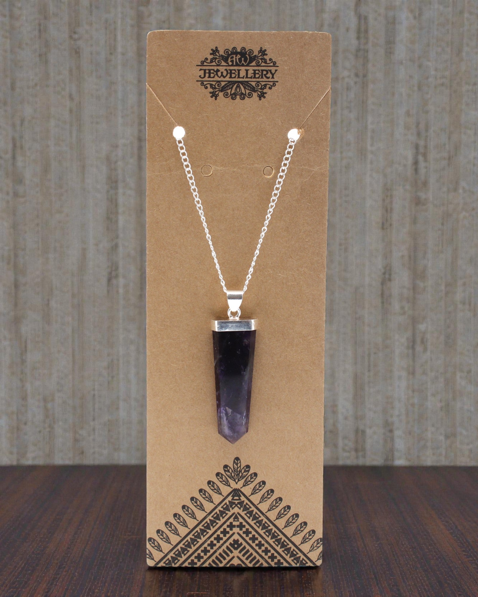 Violet Ray – Ciondolo piatto in ametista con taglio a cristallo