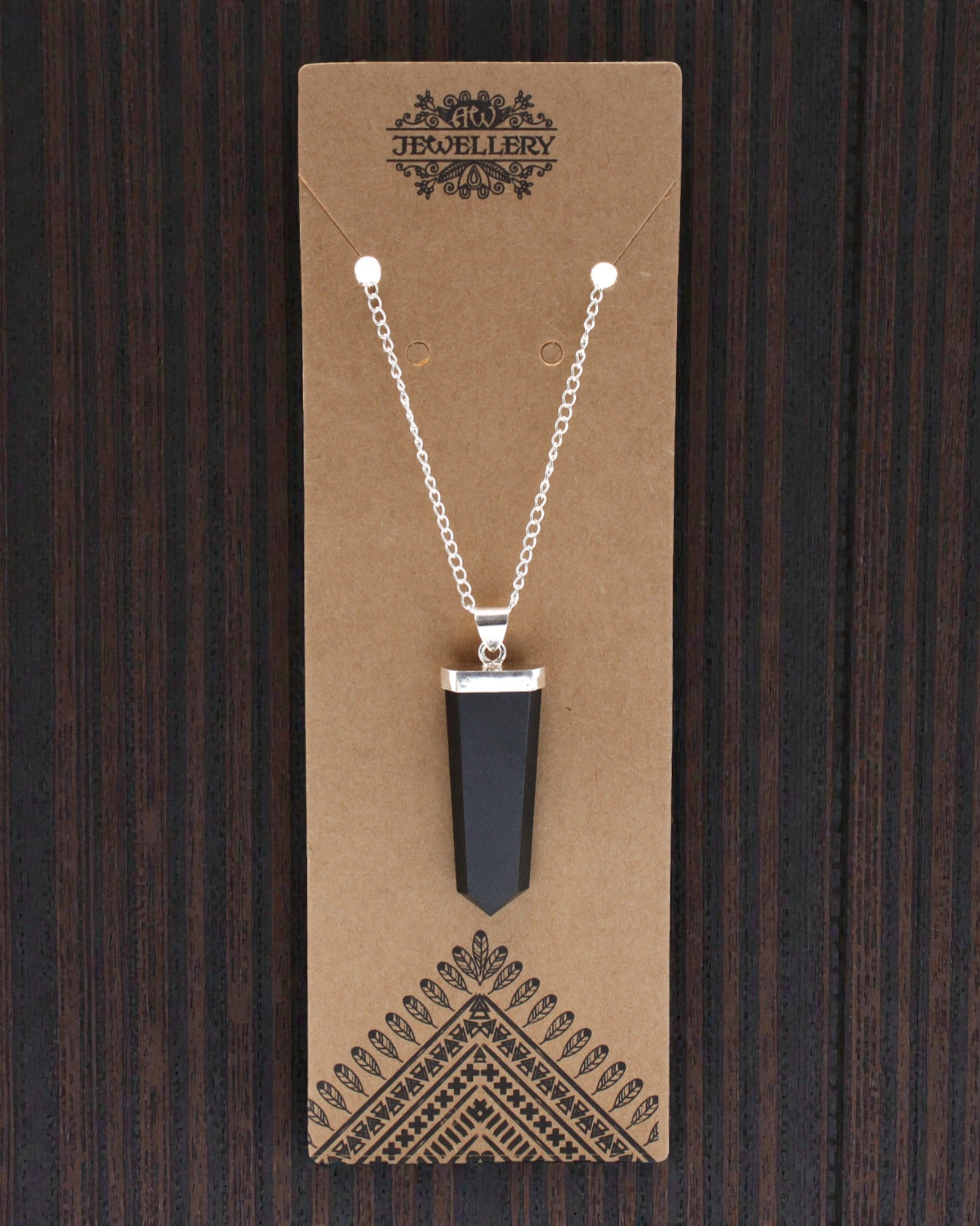 Obsidian Ray – Pendente piatto in agata nera con sfaccettatura a cristallo