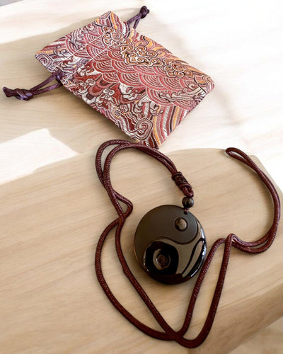 Collana Boho in Ossidiana Yin Yang Tai Chi, possibilità di personalizzazione con incisione per regalo