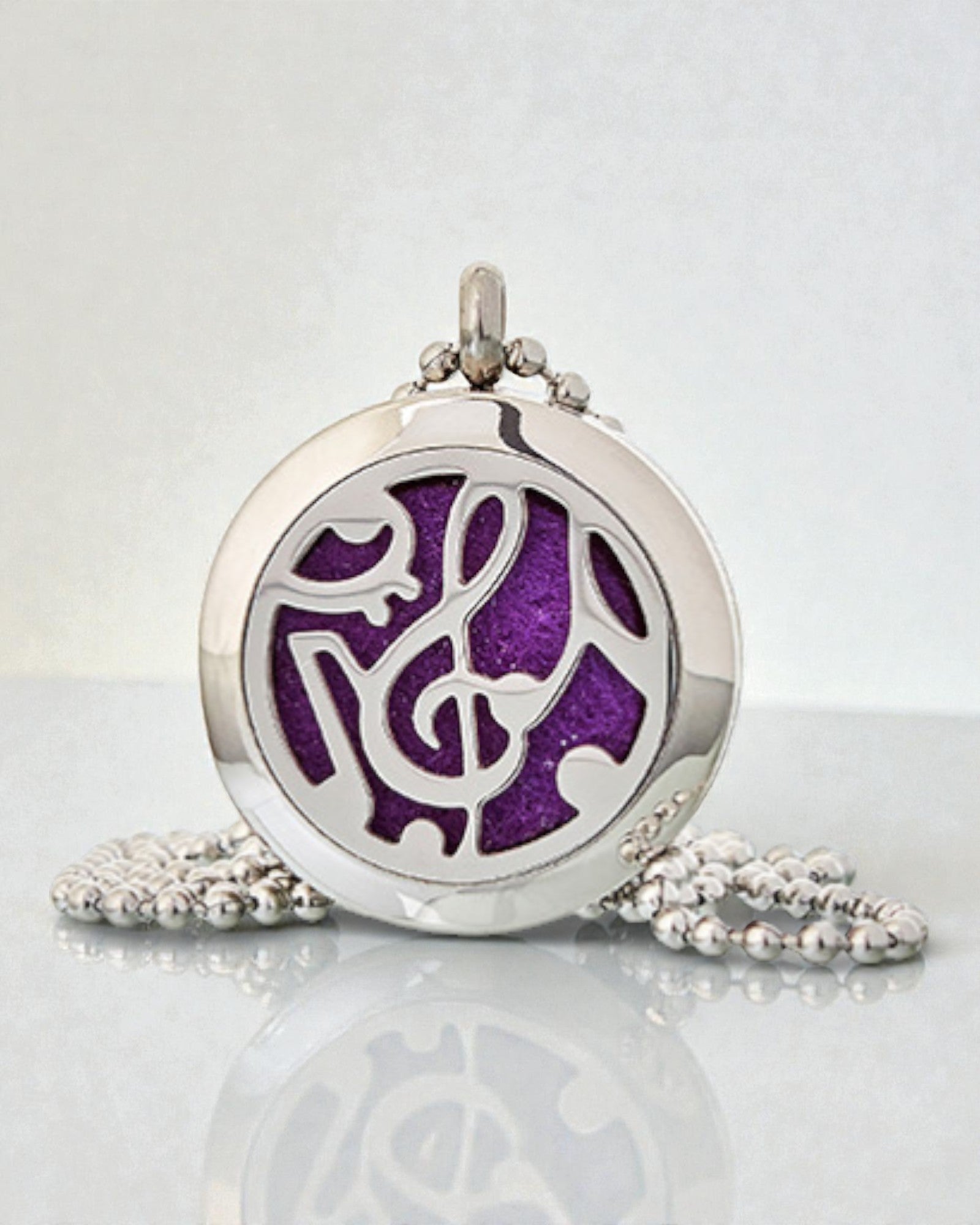 Sinfonia del Profumo – Collana di aromaterapia con motivo di note musicali 25 mm