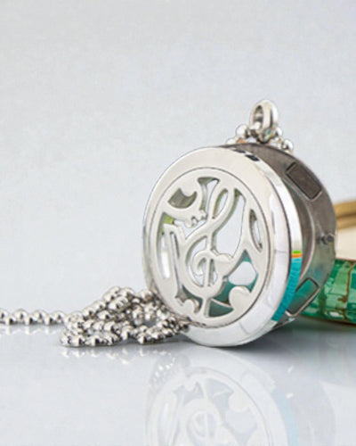 Sinfonia del Profumo – Collana di aromaterapia con motivo di note musicali 25 mm