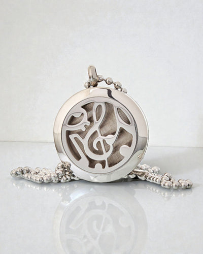 Sinfonia del Profumo – Collana di aromaterapia con motivo di note musicali 25 mm