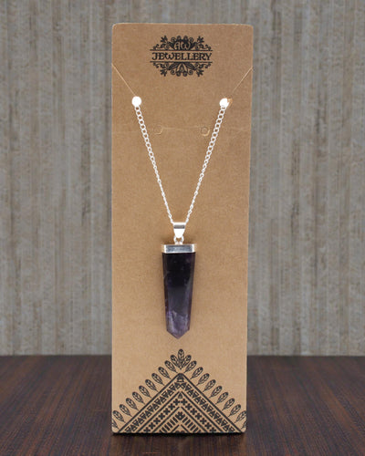 Violet Ray – Ciondolo piatto in ametista con taglio a cristallo