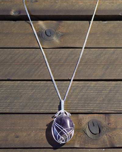 Ricciolo della Pace – Collana con ametista intrecciata a mano