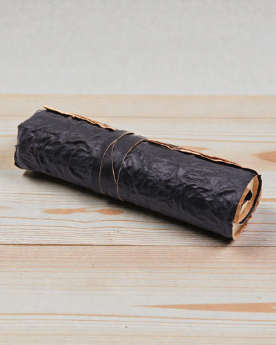 Taccuino da viaggio arrotolato in pelle - 96 pagine - Nero 21x15cm